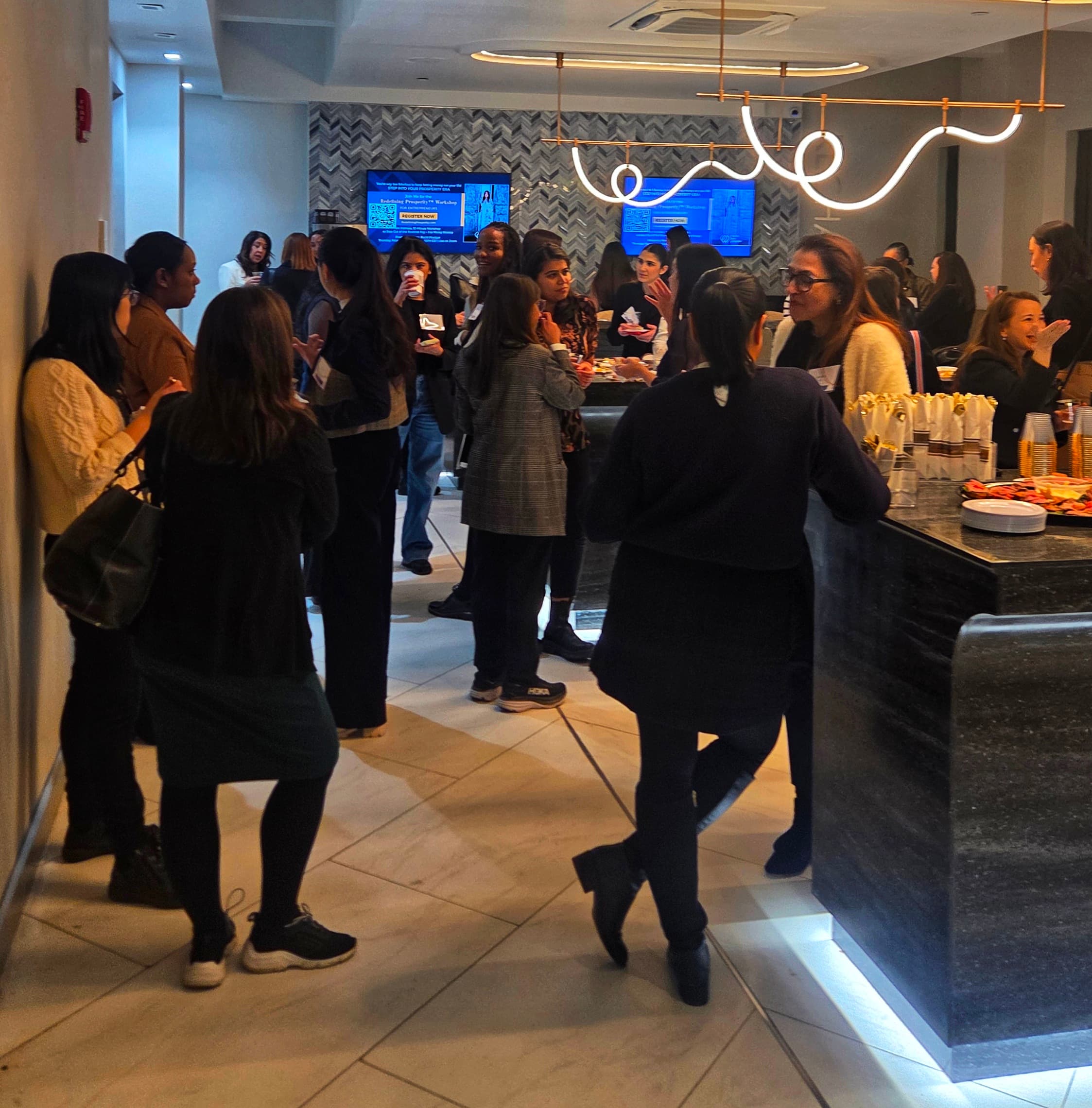 Women gathered together in conversation at a LaddHers event